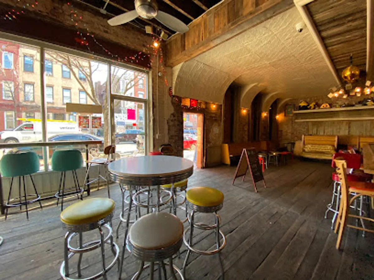 Interior of Duckduck bar in Williamsburg with guests enjoying drinks