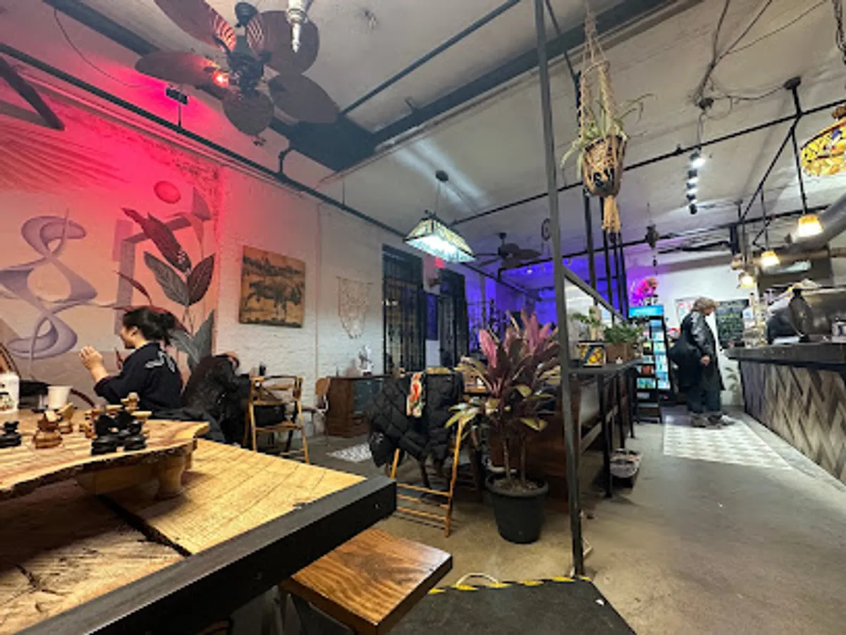 Customers enjoying coffee and live music at Crossroads Cafe in Bushwick.