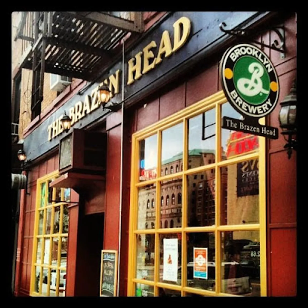 Interior view of The Brazen Head bar with patrons enjoying drinks