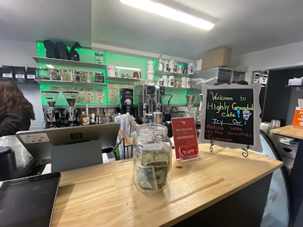 Interior view of Highly Grounded Cafe in Brooklyn with customers enjoying coffee
