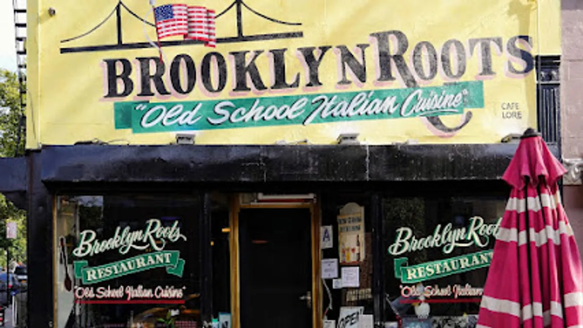 Interior view of Brooklyn Roots Italian showing tables and decor