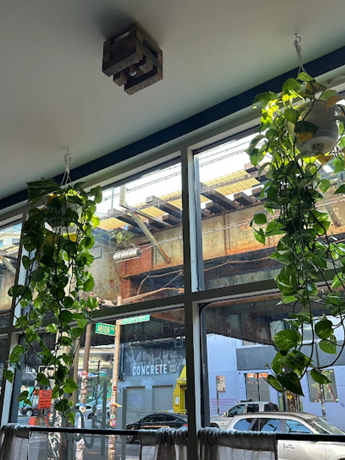 Interior view of High & Dry Coffee Bar with customers enjoying drinks