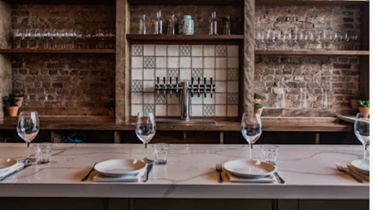 Interior view of Camillo restaurant, showcasing dining setup and ambient lighting