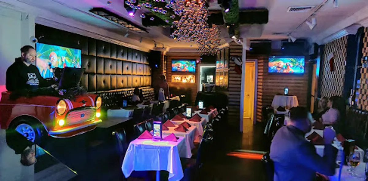 Interior view of Carro Cafe NY showing diners and vibrant decor