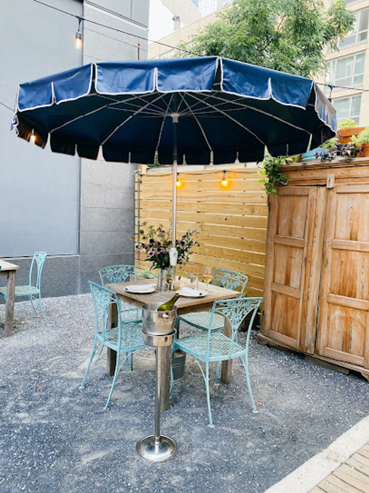 Cozy and trendy dining area inside M. Wells restaurant in Brooklyn
