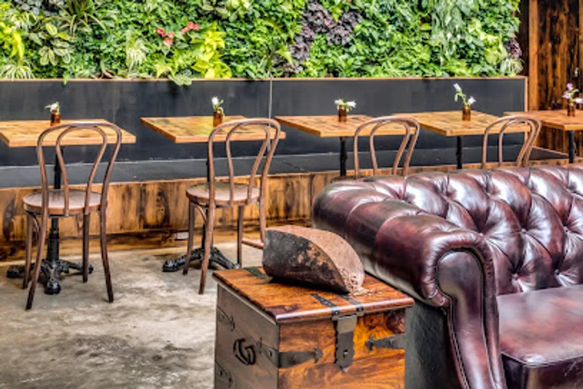 Interior view of Devoción coffee shop in Williamsburg with customers