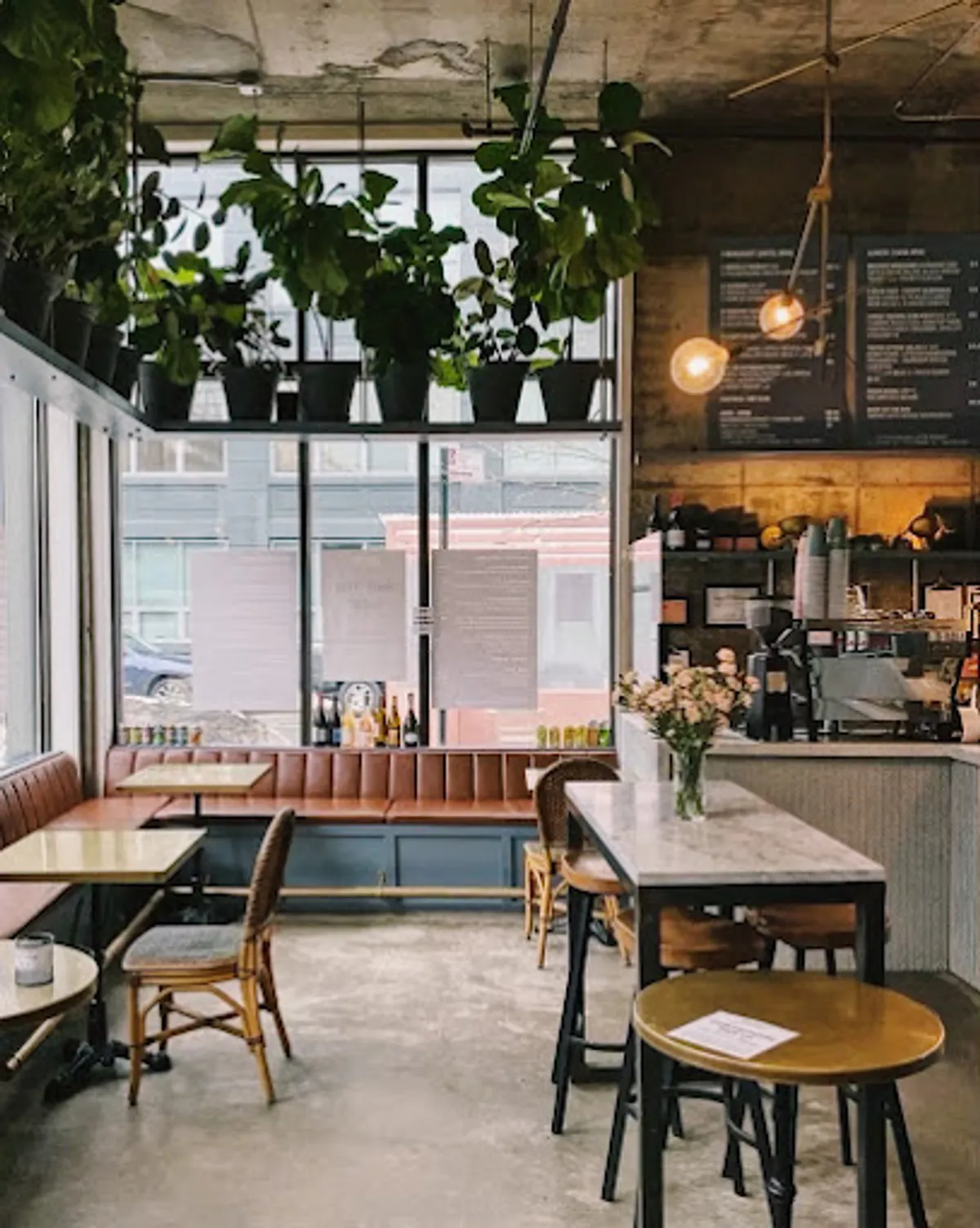 Interior view of Butler cafe in Williamsburg with customers enjoying coffee