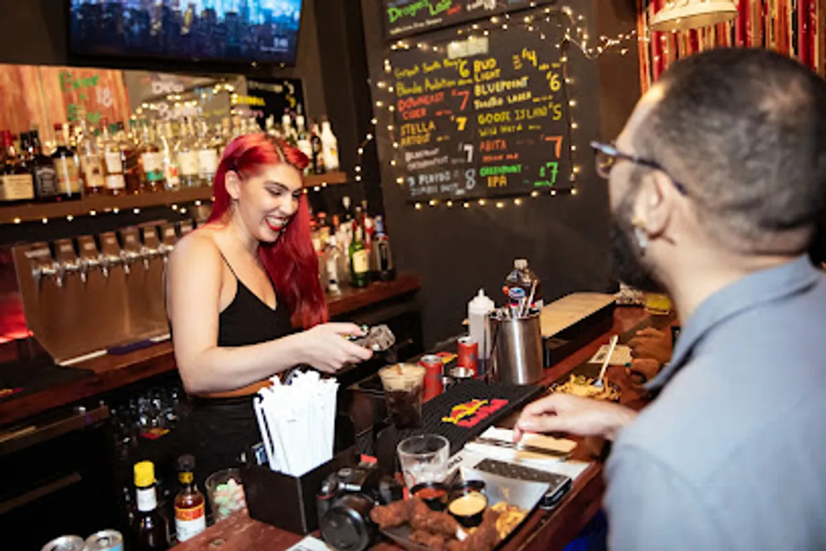 Interior view of BrookLAN showing people gaming and dining