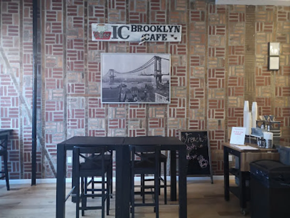 Customers enjoying coffee and bagels at IC Brooklyn Cafe in Bushwick.
