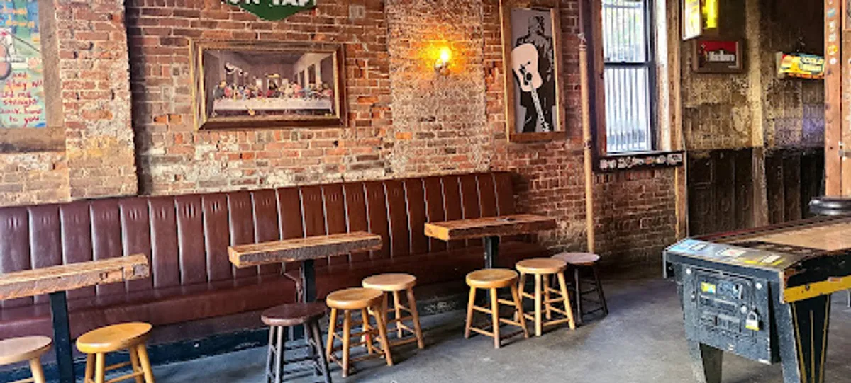 Crowd enjoying live music at Skinny Dennis bar in Williamsburg